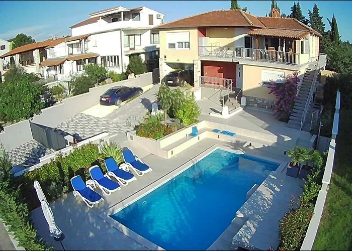 With Heated Pool, Regina Pula